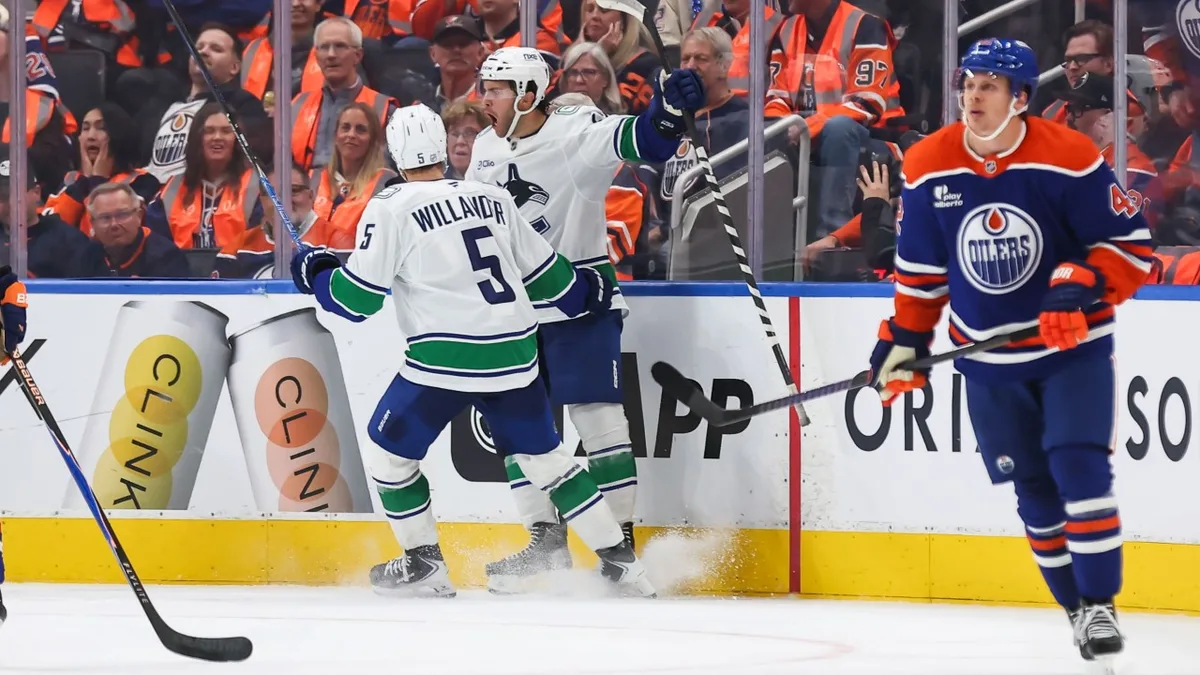 Cotter's OT Winner Lifts Canucks Past Oilers 6-5 in Opener
